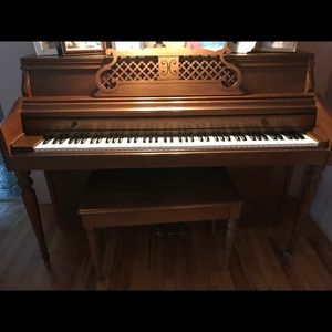 Piano with bench and lamp